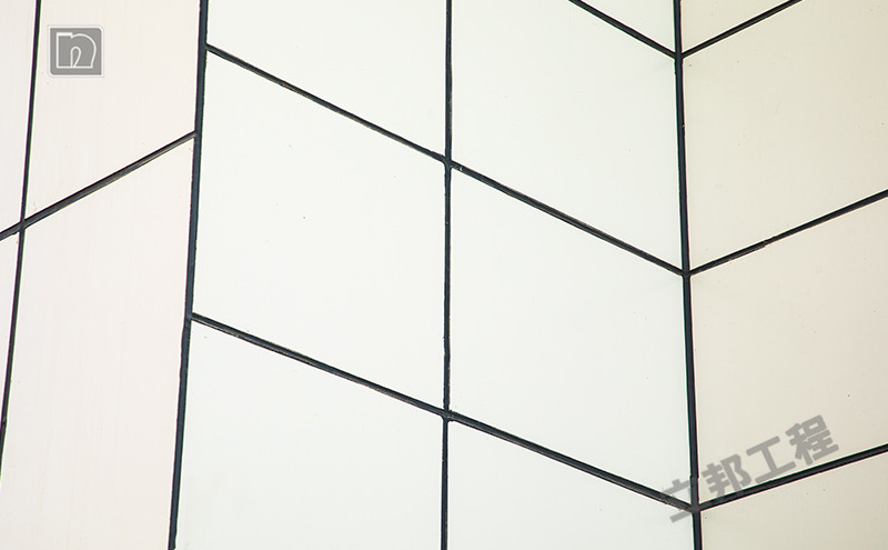 兰州新区东航国际广场采用立邦太空板保温装饰一体板近距离效果.png